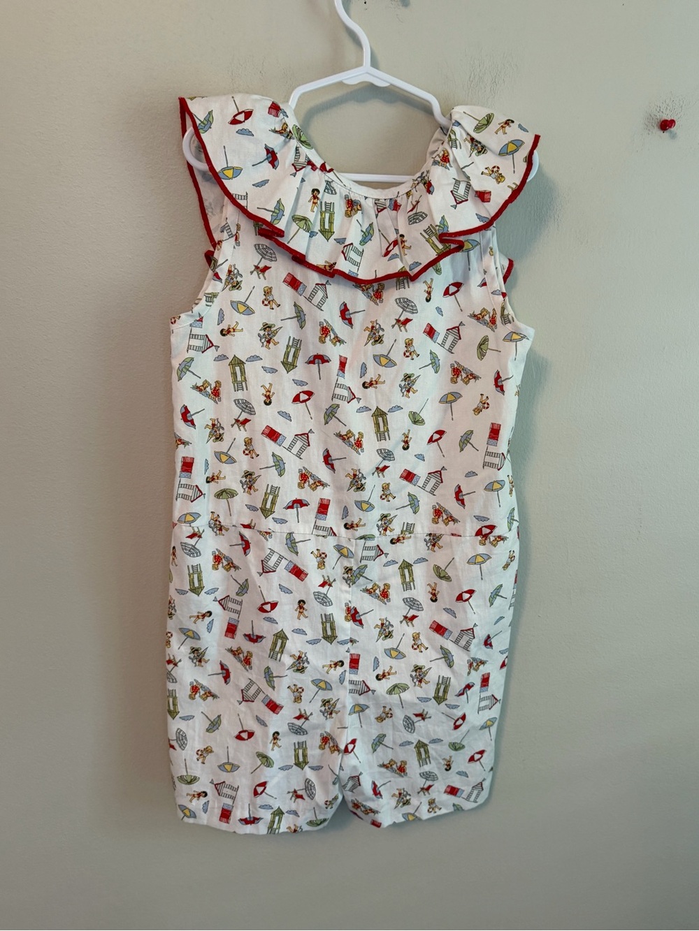 Bella Bliss White Beach Print Ruffle Romper with Red Trim